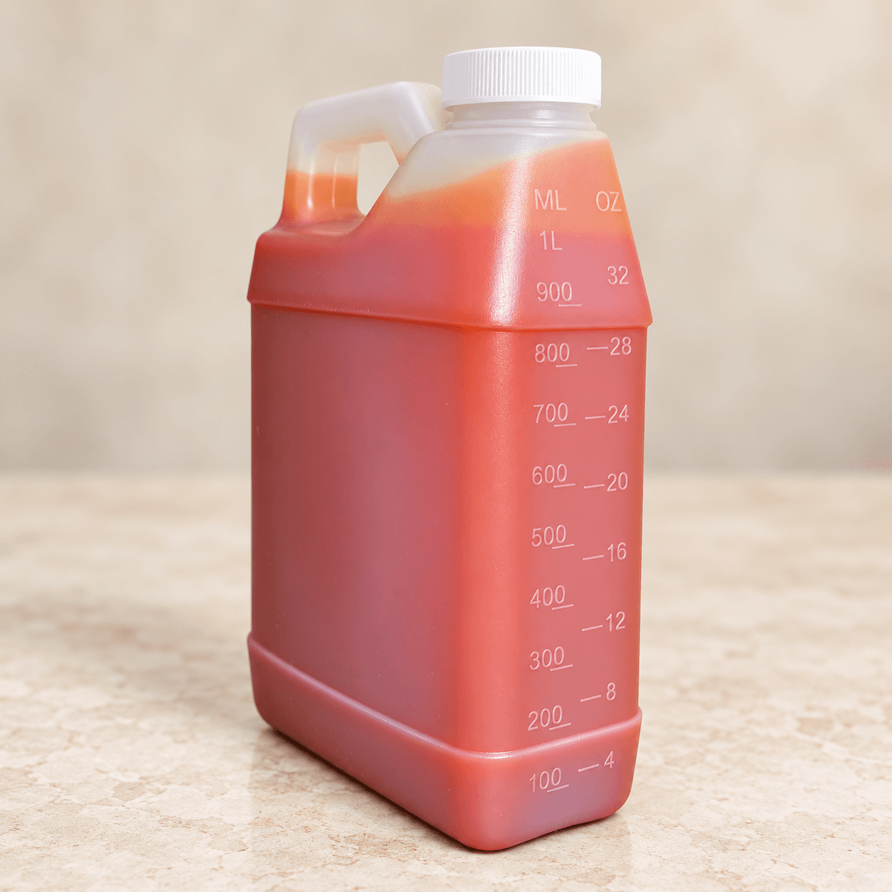 African red palm oil in a 32 oz jug.